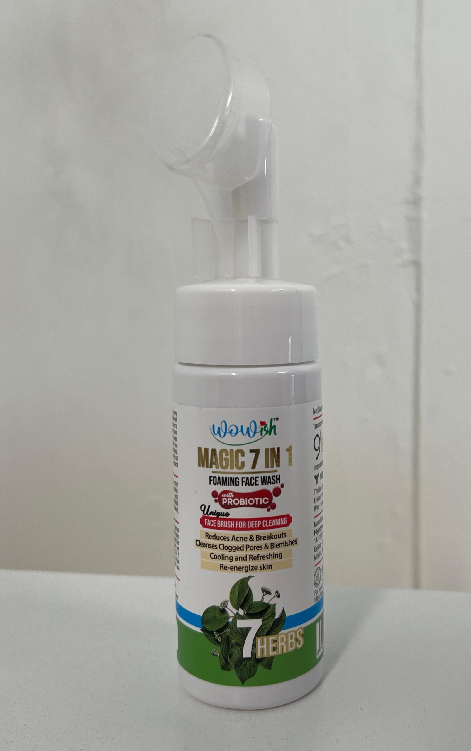 Front view of Wowish Magic 7 in 1 Foaming Face Wash bottle with probiotic formula and brush applicator, designed for acne control and deep cleansing.