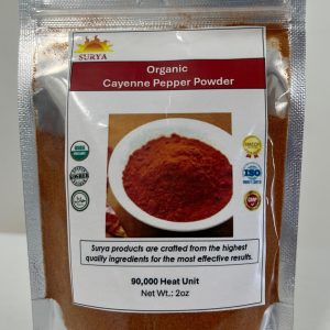 Front view of Surya Organic Cayenne Pepper Powder (90,000 heat units) in a silver pouch with a bowl of red pepper powder and USDA Organic label.