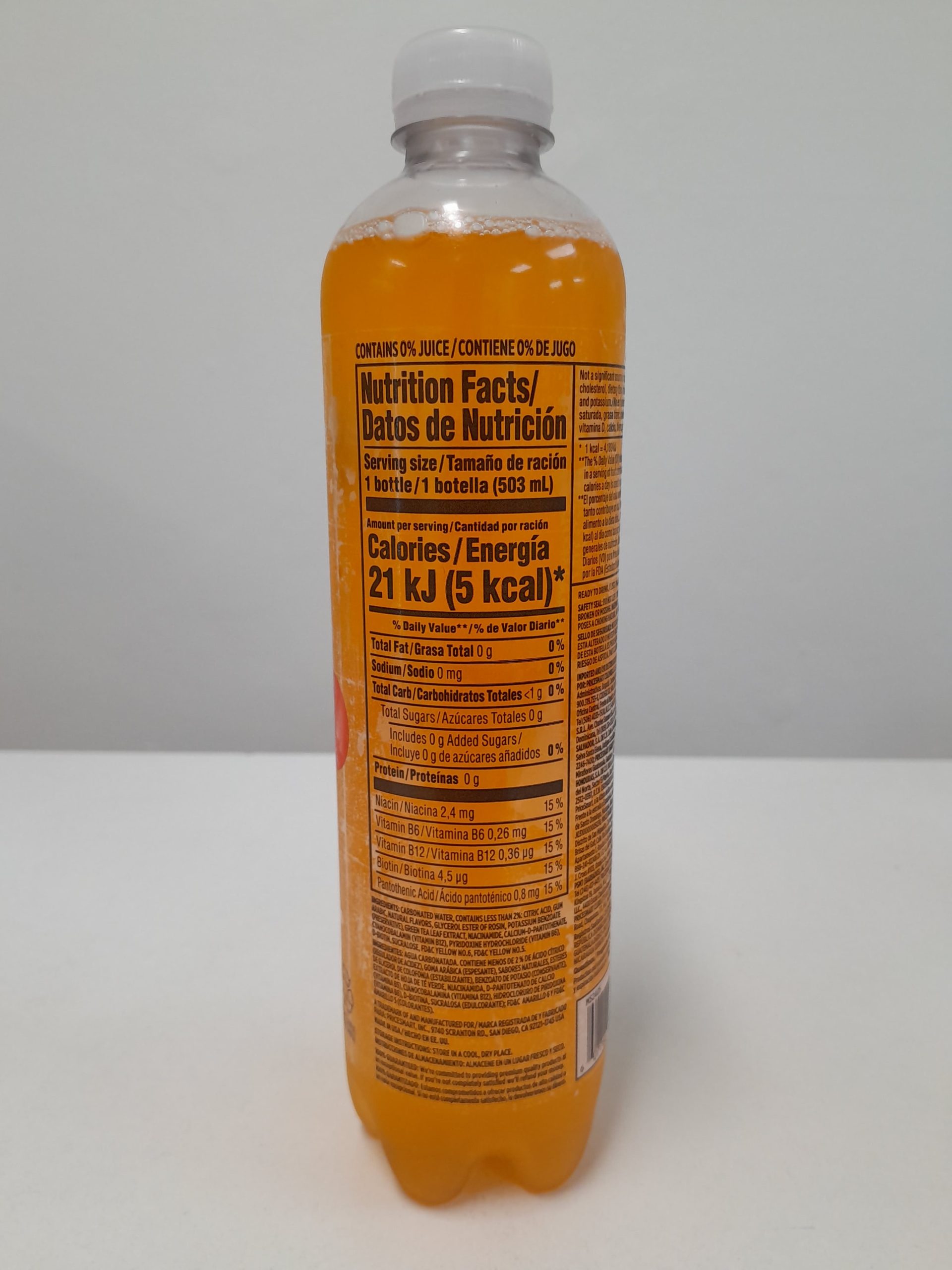 Member’s Selection Orange Mango sparkling water nutrition facts label, zero sugar carbonated beverage bottle.