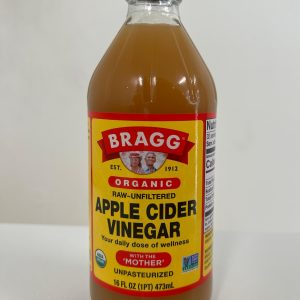 Bragg Organic Raw-Unfiltered Apple Cider Vinegar with the “Mother” in a 16 fl oz (473mL) bottle featuring a yellow and red label and black cap.