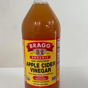 Bragg Organic Raw-Unfiltered Apple Cider Vinegar with the “Mother” in a 32 fl oz (946mL) bottle featuring a yellow and red label and black cap.